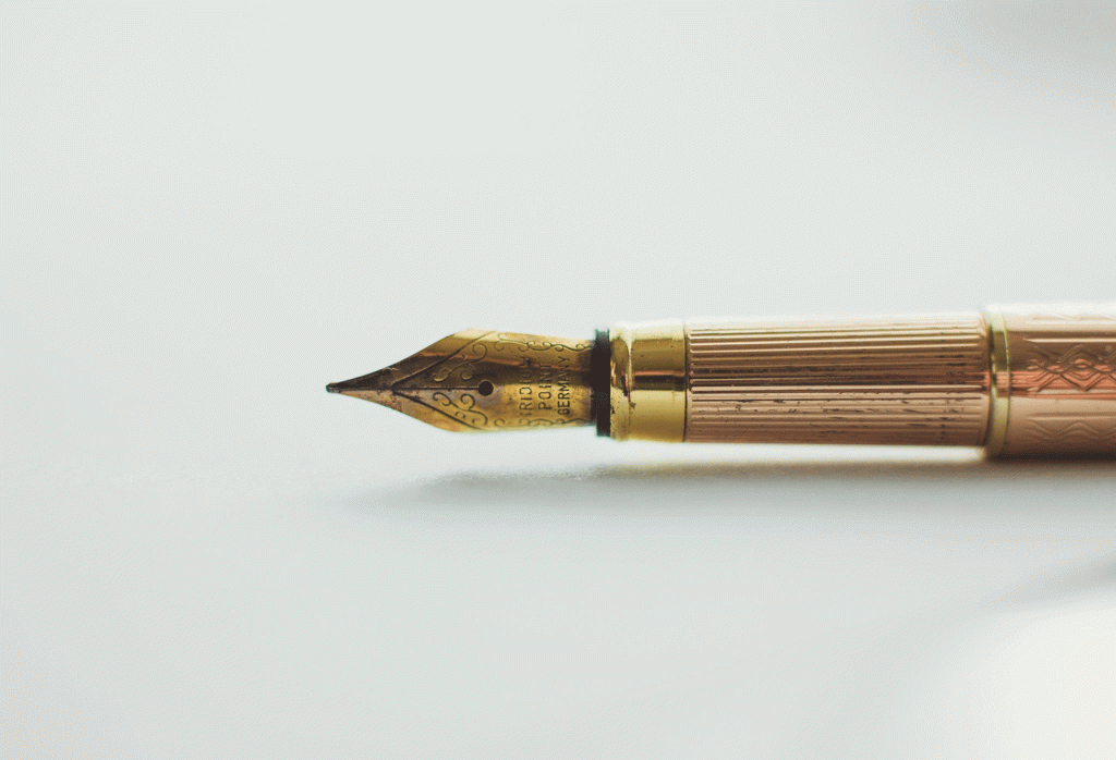 Old-fashioned gold fountain pen