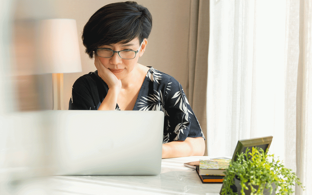 Young woman working at laptop